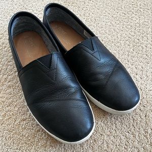 2 Pairs of Tom’s slip-ons (black leather and blue denim)